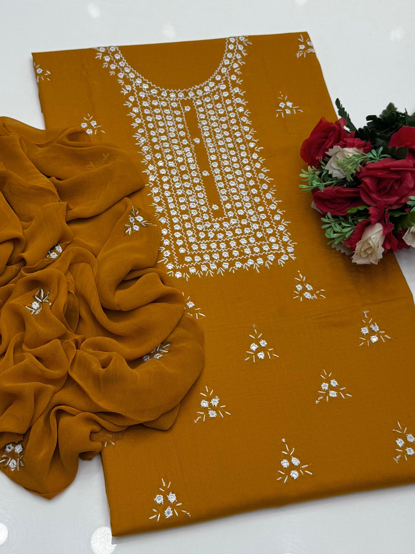 Handcrafted multani embroidry mirror work Lawn Suit